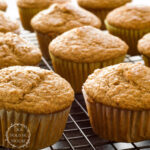 muffins on a cooling rack with the words banana muffins with maple sugar in the foreground