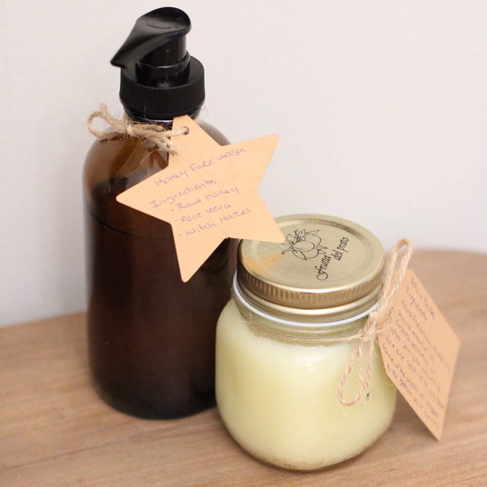 glass jar with pump top labeled with label tied to it, next to a jar of tallow balm