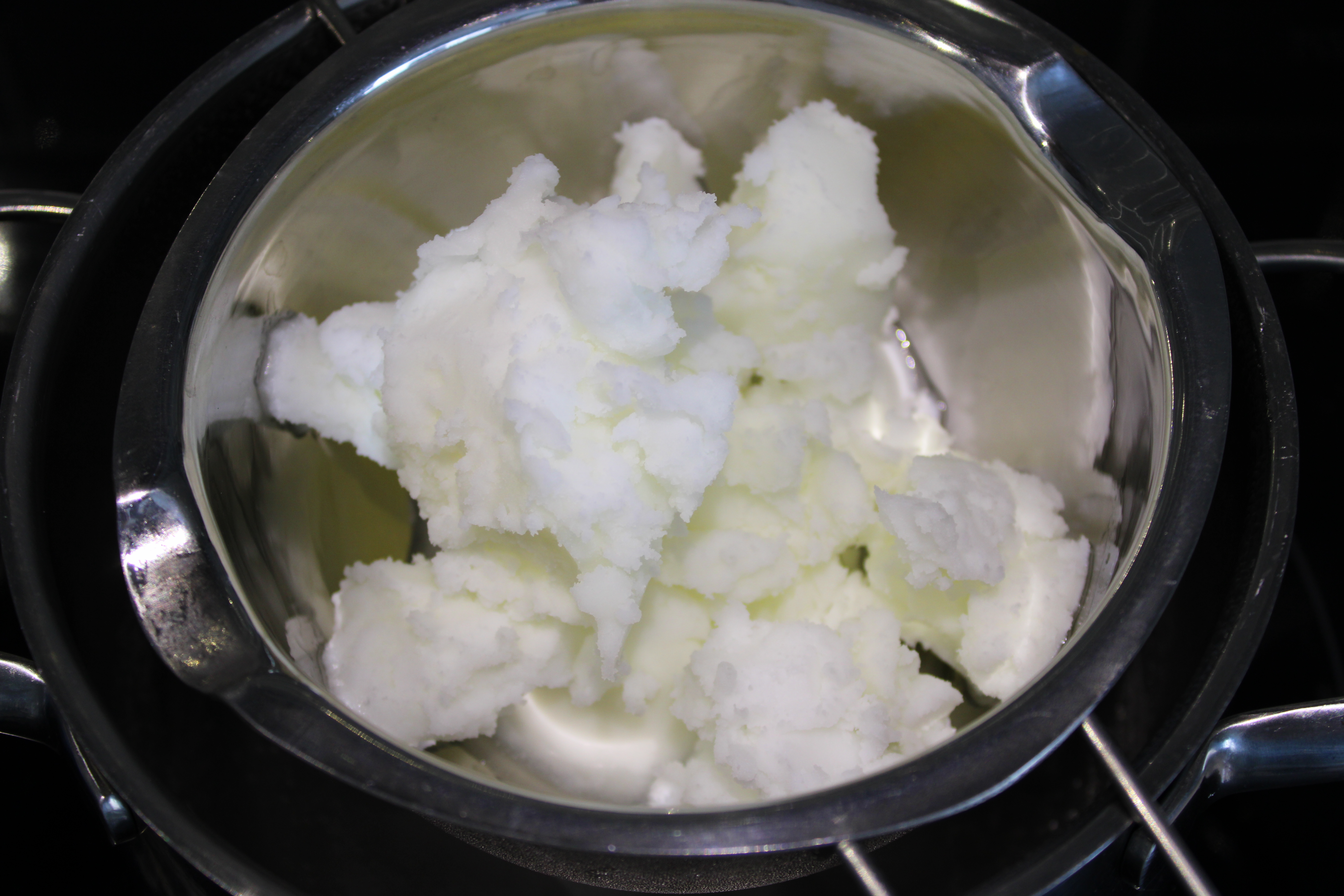 grass-fed tallow in a double boiler