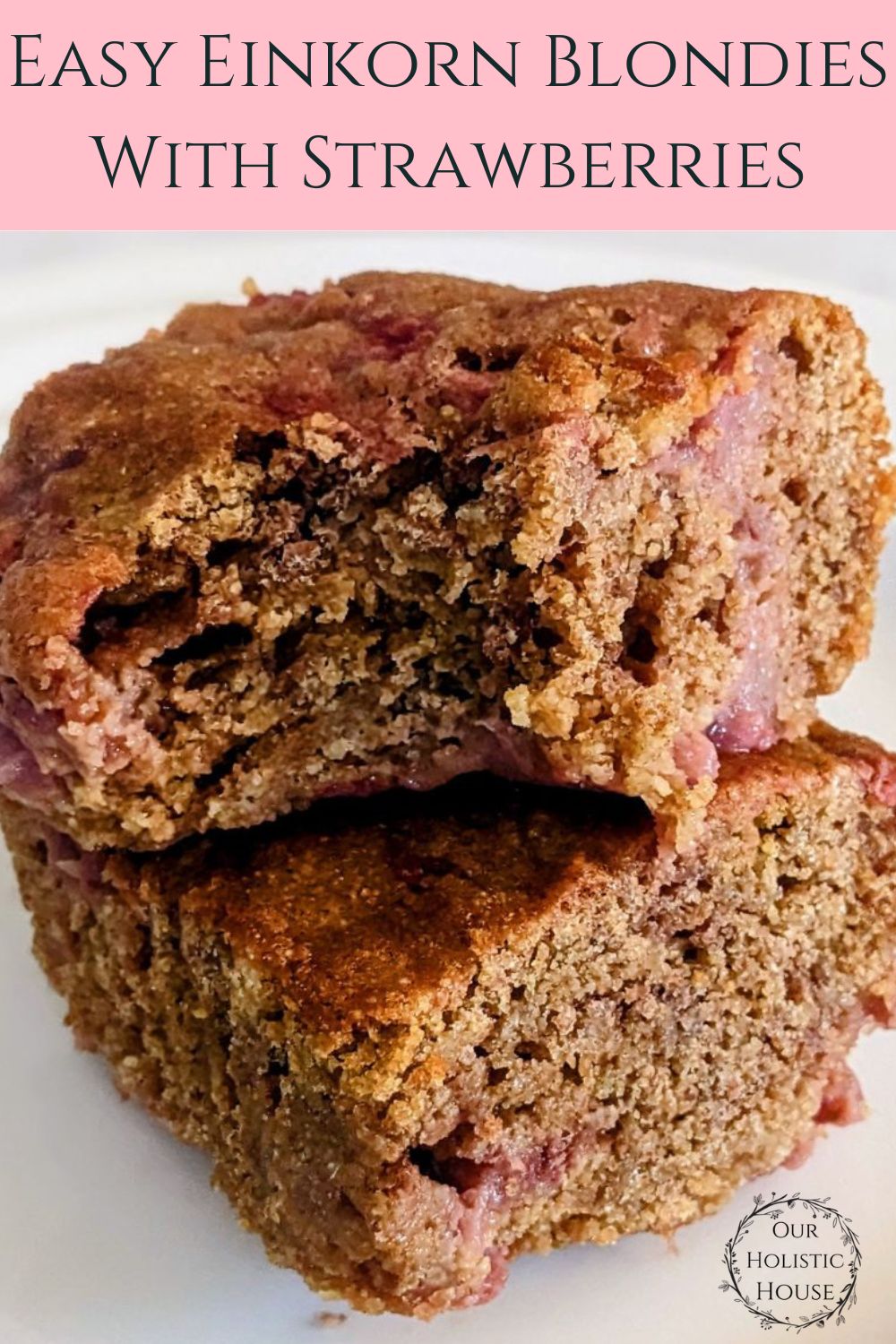 close up of two einkorn blondies stacked with a bite out of one