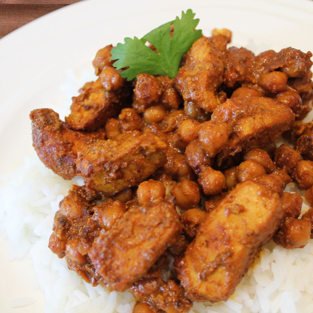 butter chicken on a bed of rice